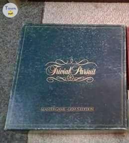 Photo of 3 Trivial Pursuit games