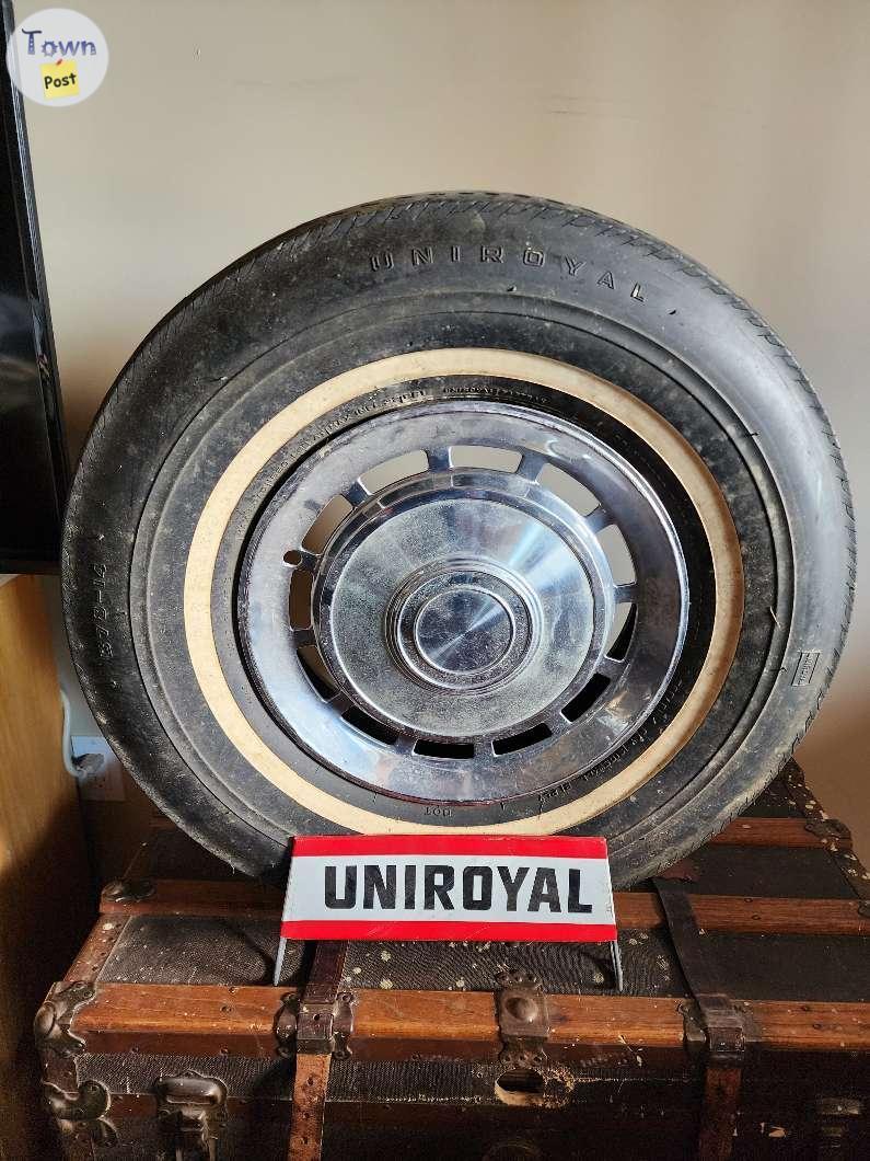 Photo of Vintage metal uniroyal tire display 