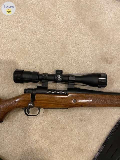 Photo of Mossberg .243 bolt action rifle with Vortex Diamondback scope & sling