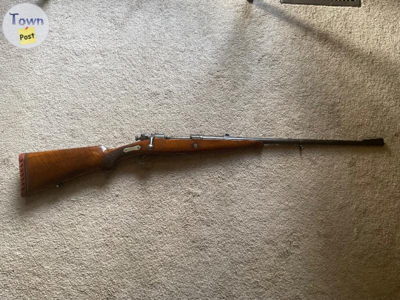 Photo of 10.75X68 Mauser 1903 Springfield with loading supplies