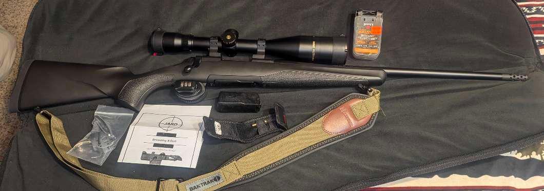 Photo of .243 Browning x-bolt micro Midas with ammo. Scope sold.